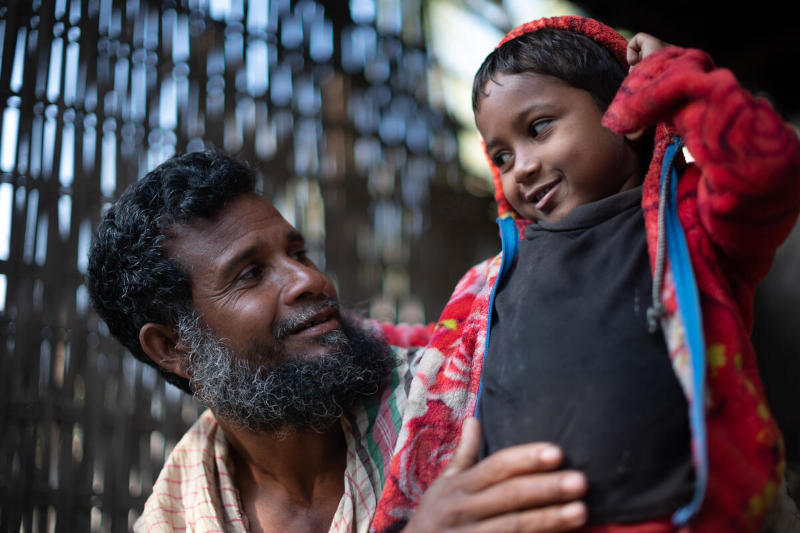 Toslim Uddin and his son, Bangladesh. Photo: WFP/Mehedi Rahman