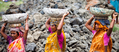 women carrying food