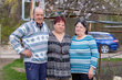 Oxana (middle) standing with Tudor and Ana